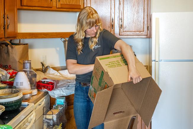 Caring Transitions team member providing home cleanout services in Maryland